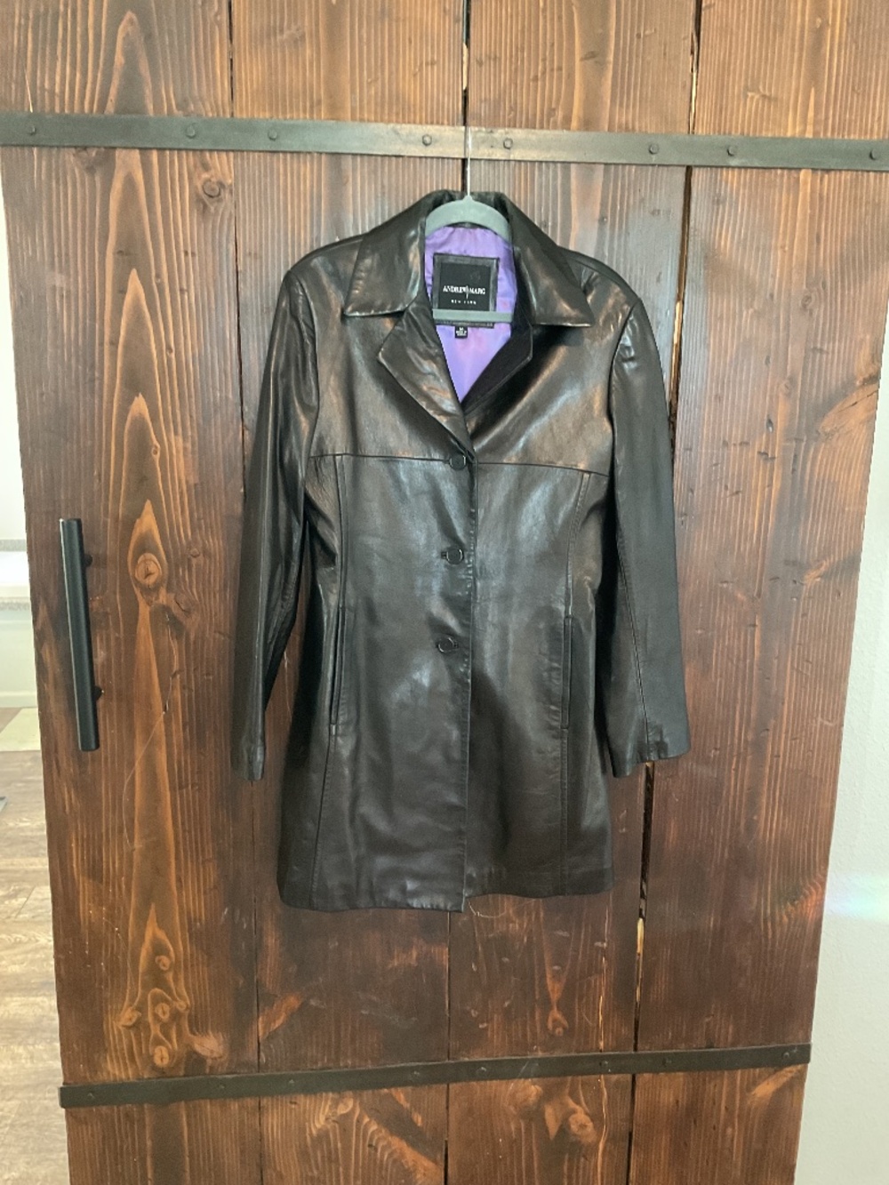 Andrew Marc size medium long leather jacket